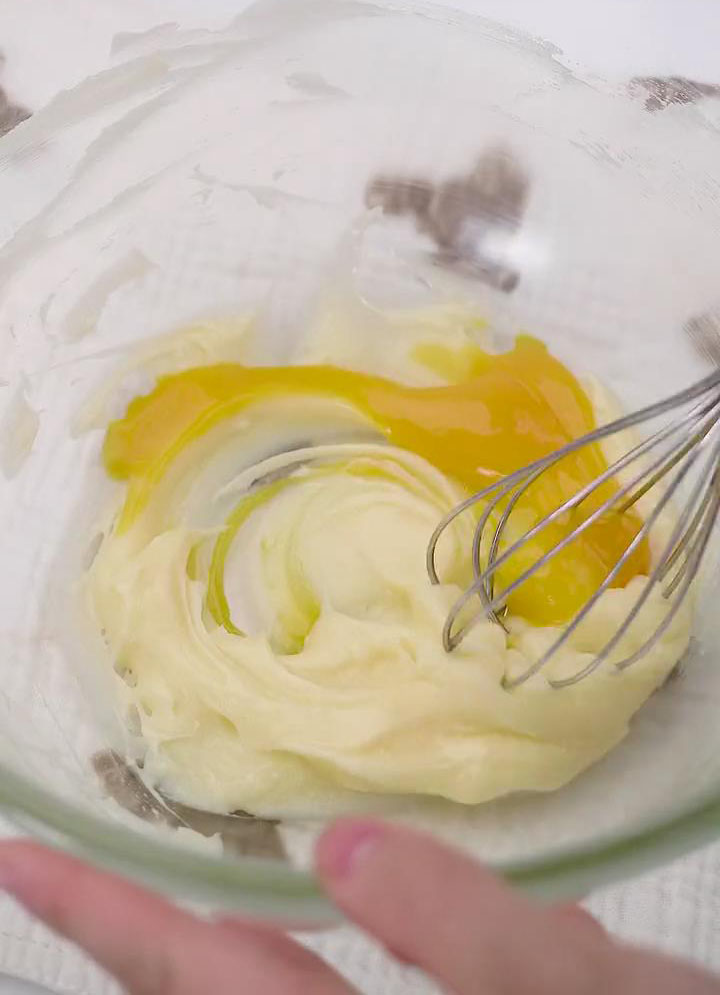 add the egg yolk and continue mixing