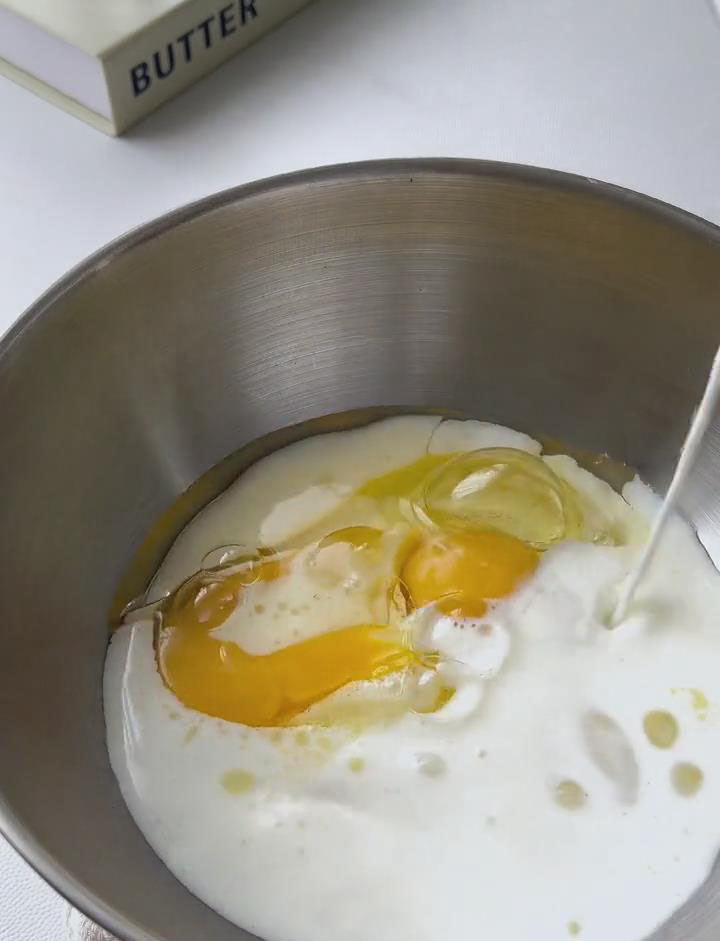 crack 2 eggs into a mixing bowl