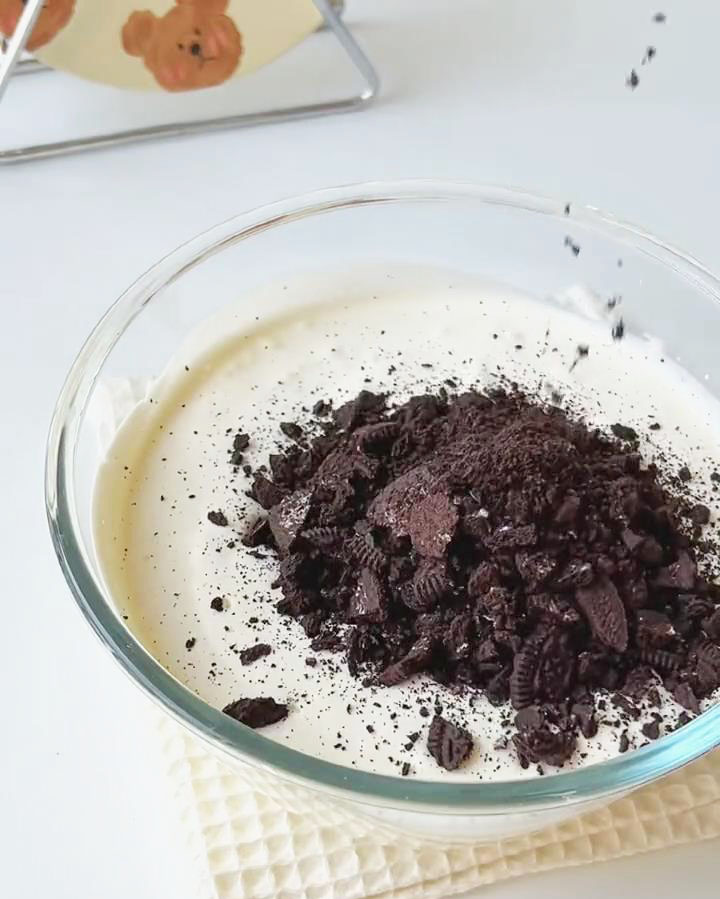 gently fold the finely crushed oreo crumbs into the whipped cream mixture gently fold the finely crushed oreo crumbs into the whipped cream mixture