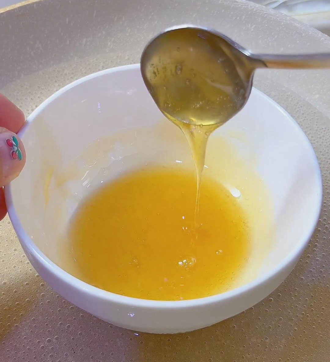 heat the maltose over a water bath until fully melted into a thin liquid consistency