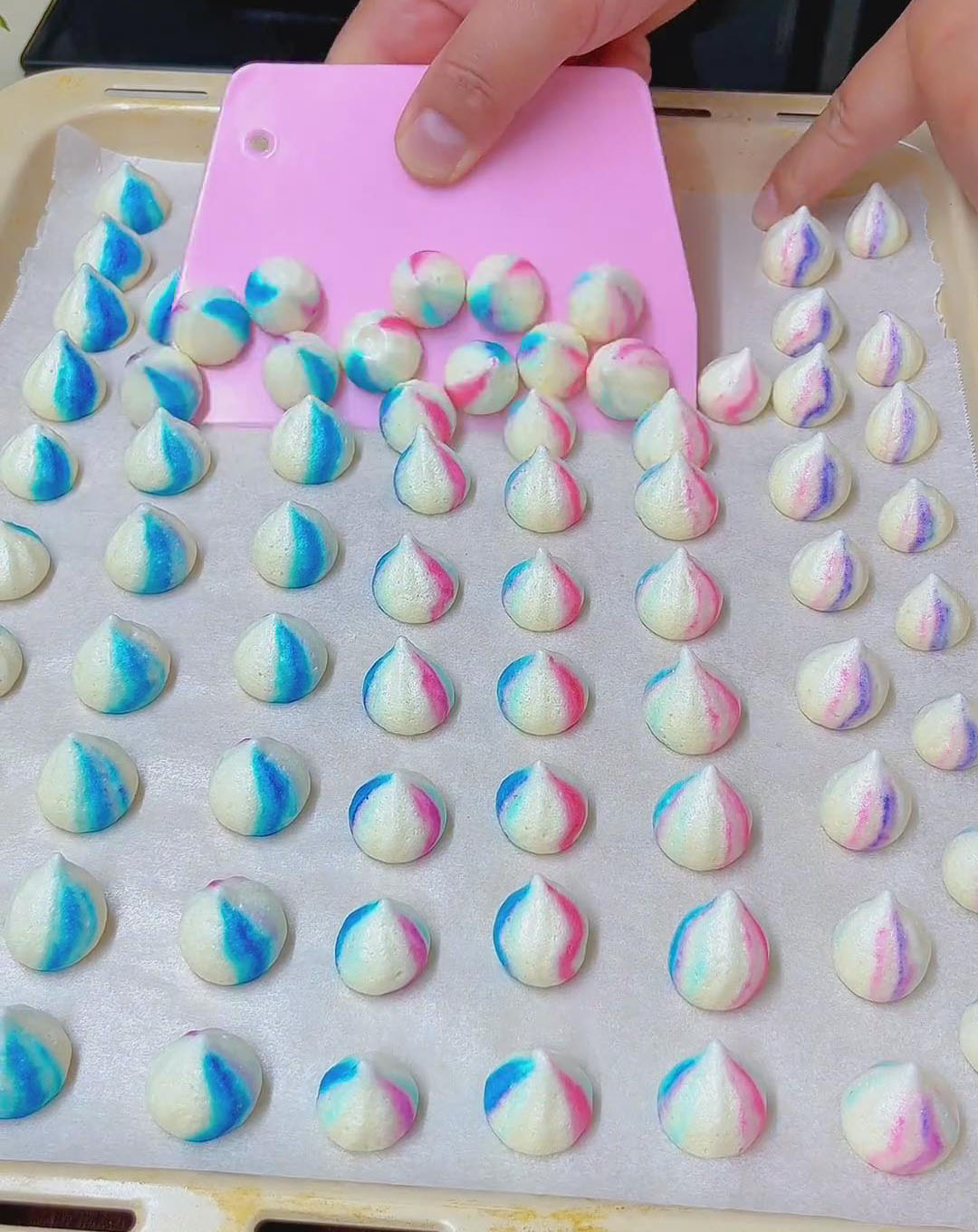 lift meringue cookies from the tray using a spatula