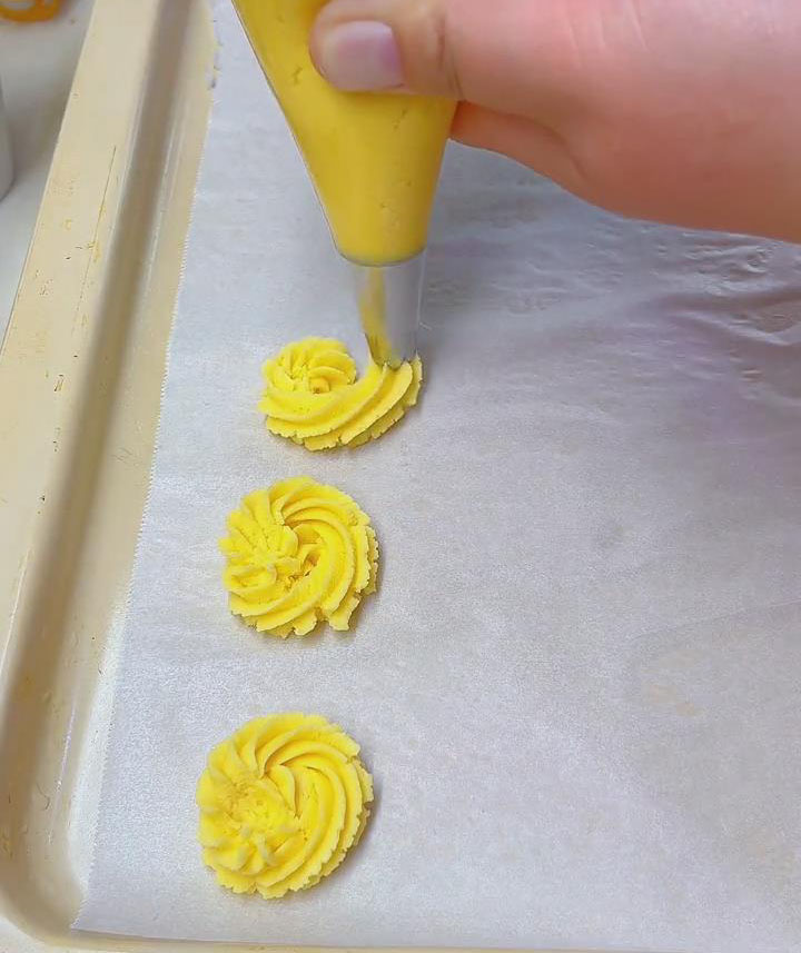 pipe the dough onto a baking sheet