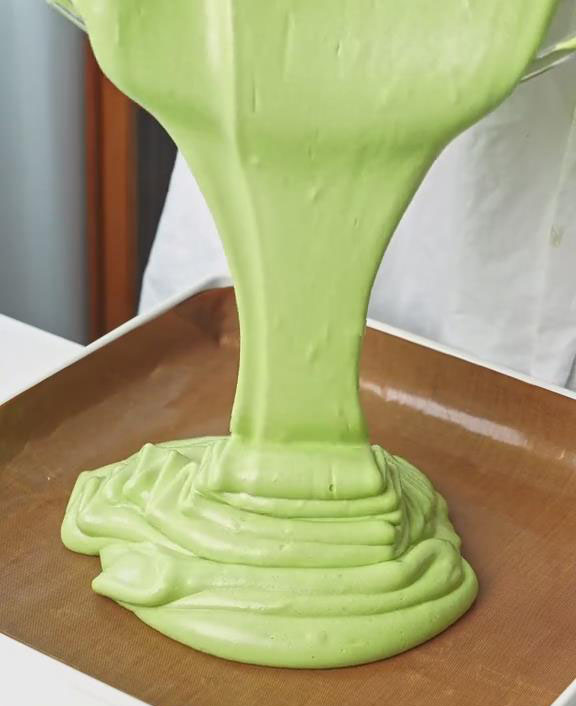pour the batter into the prepared baking tray