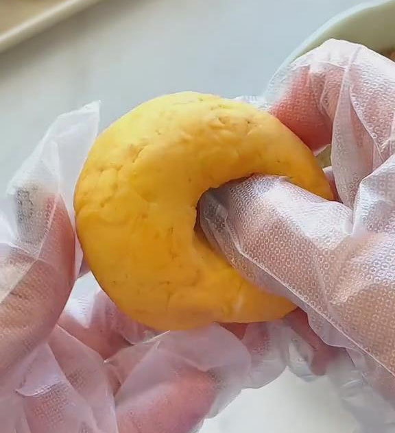 press a hole in the center with your thumb
