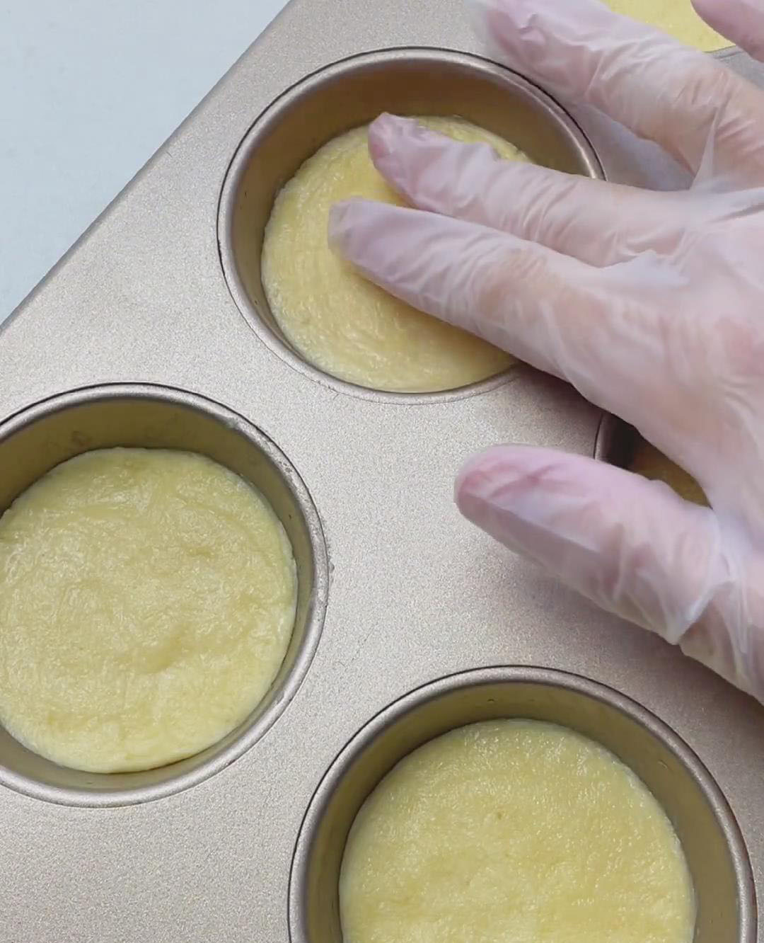 smooth any uneven spots on the cookies with a damp fingertip