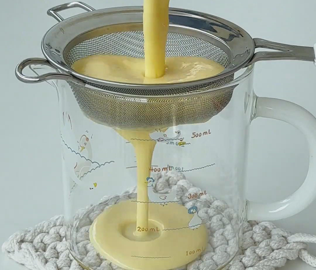 strain the panna cotta mixture strain the panna cotta mixture