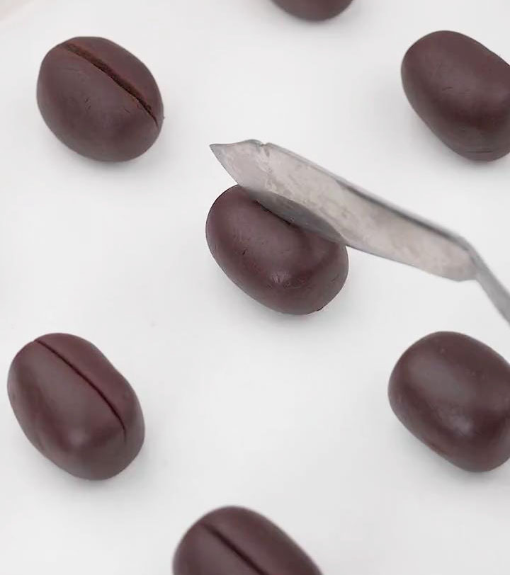 use a small knife to gently press a line into the center of each ball