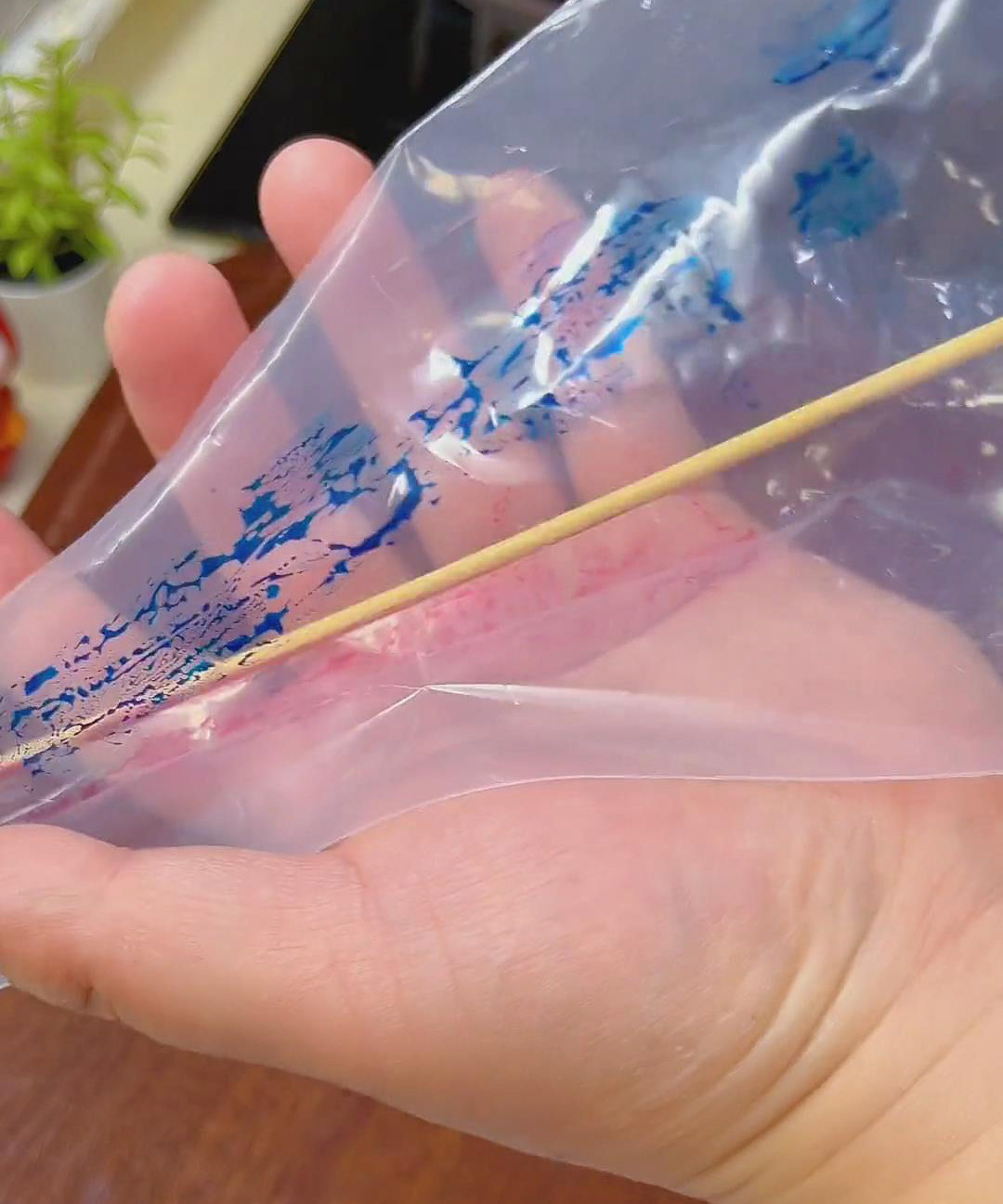 use a toothpick or skewer to draw vertical lines along the interior of the bag
