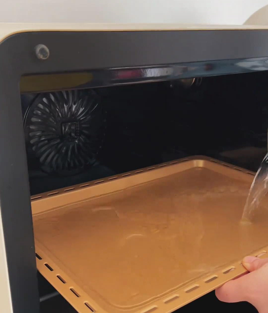 use the water bath method by placing a tray of water on the oven rack