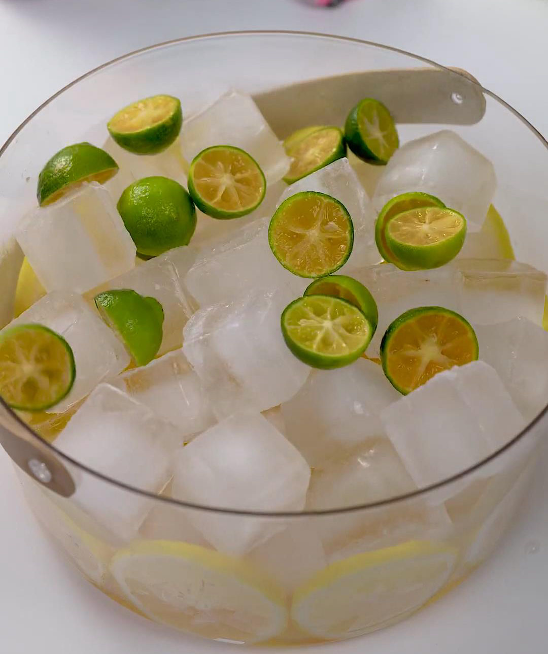 add some plain ice cubes and a few slices of kumquat add some plain ice cubes and a few slices of kumquat