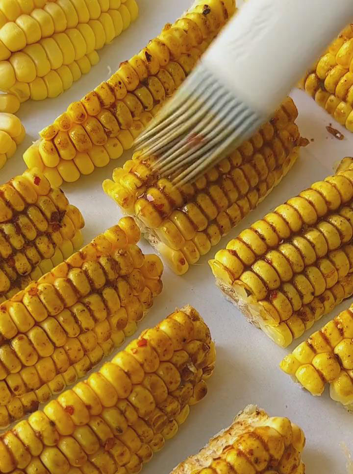 brush the marinade evenly onto each piece of corn rib