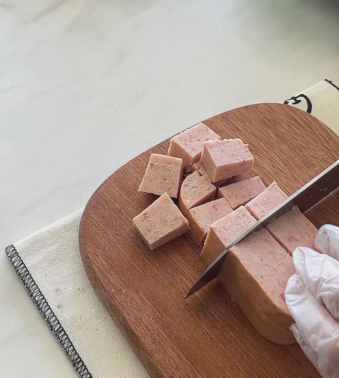 cut the luncheon meat into slices
