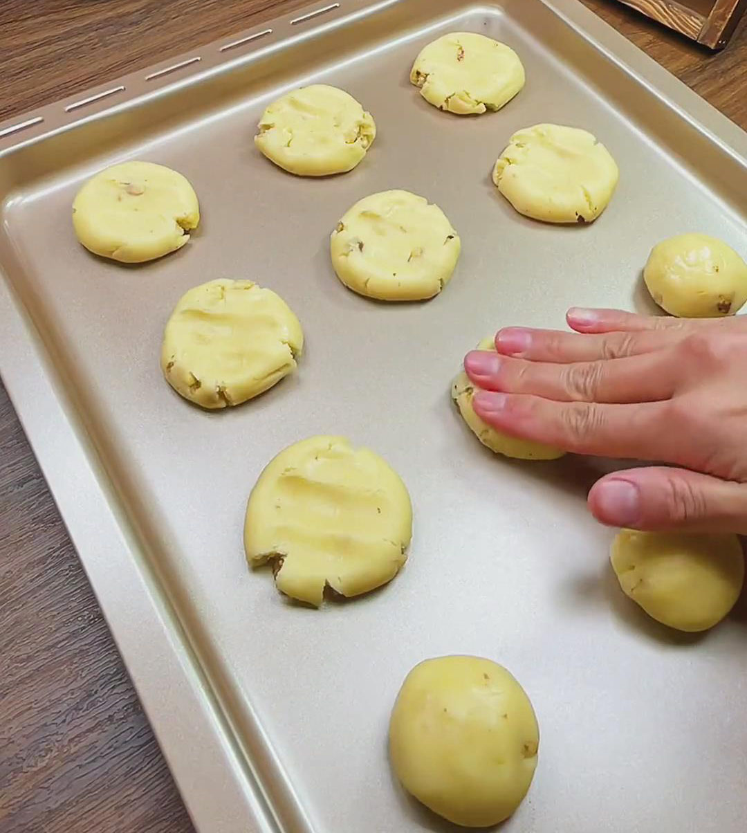 press each ball down with your fingers