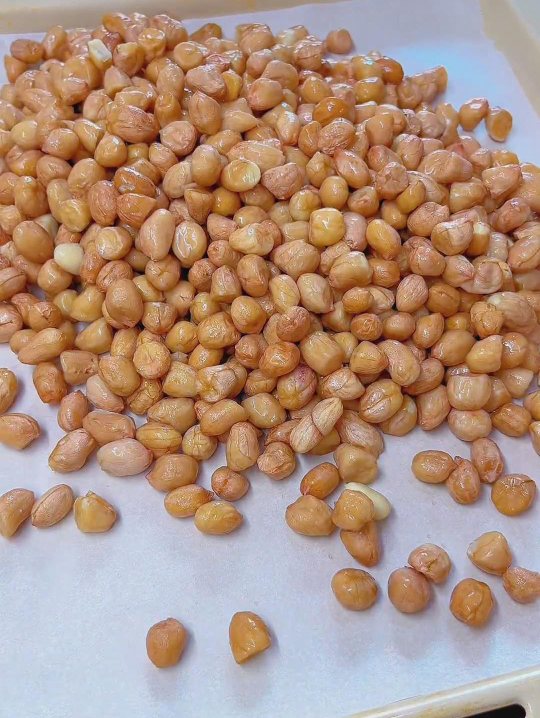 spread the peanuts evenly on a baking tray