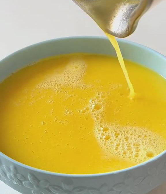 strain the blended mixture through a fine sieve into a container strain the blended mixture through a fine sieve into a container