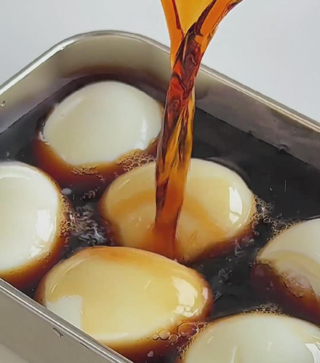 submerge the peeled eggs in the cooled marinade