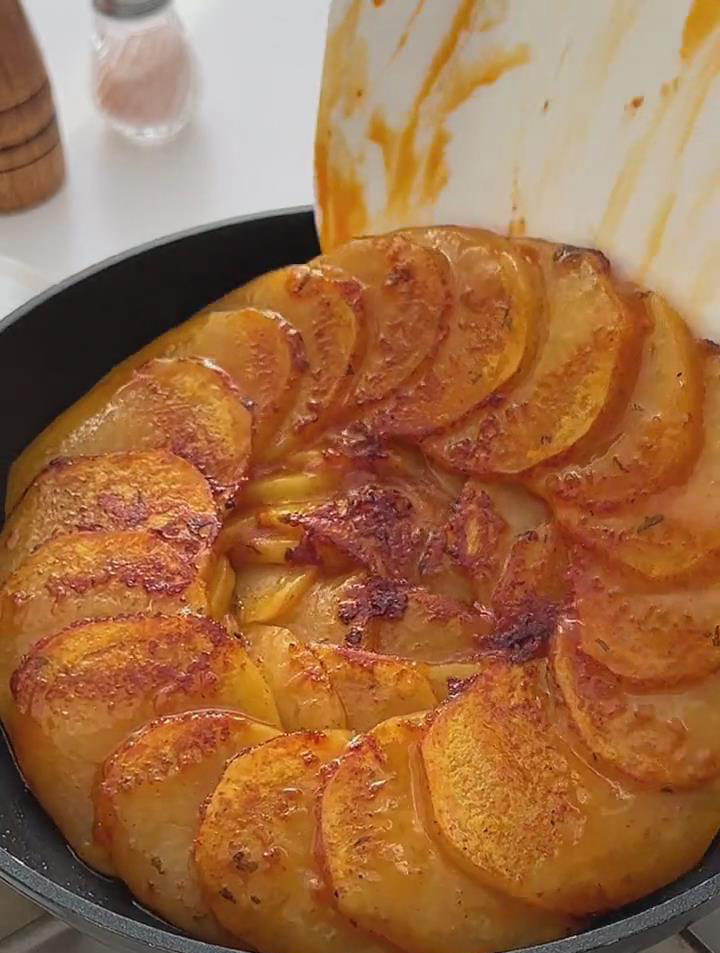 then slide the cake back into the pan