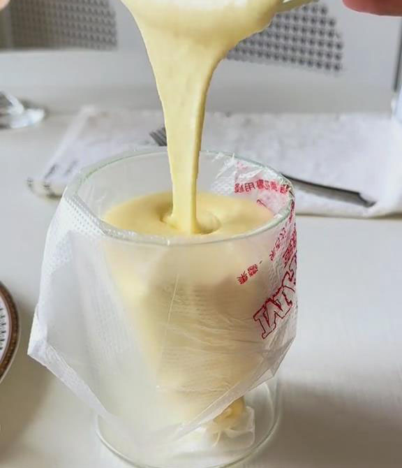 transfer the mixture to a piping bag