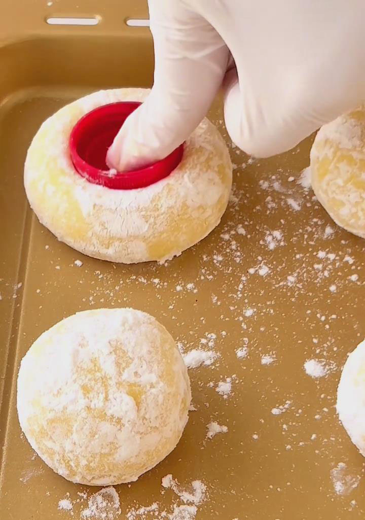 use a tool to press a deep indent into the center of each ball use a tool to press a deep indent into the center of each ball