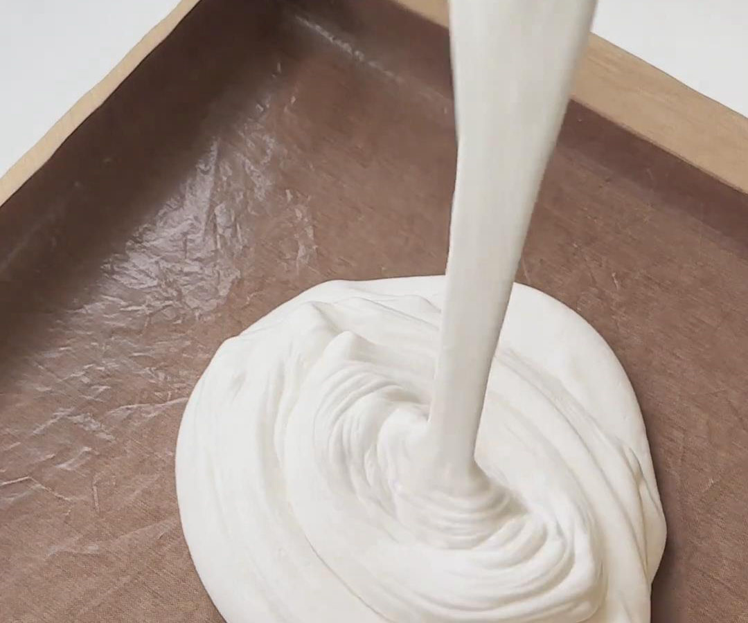pour the batter into a baking sheet