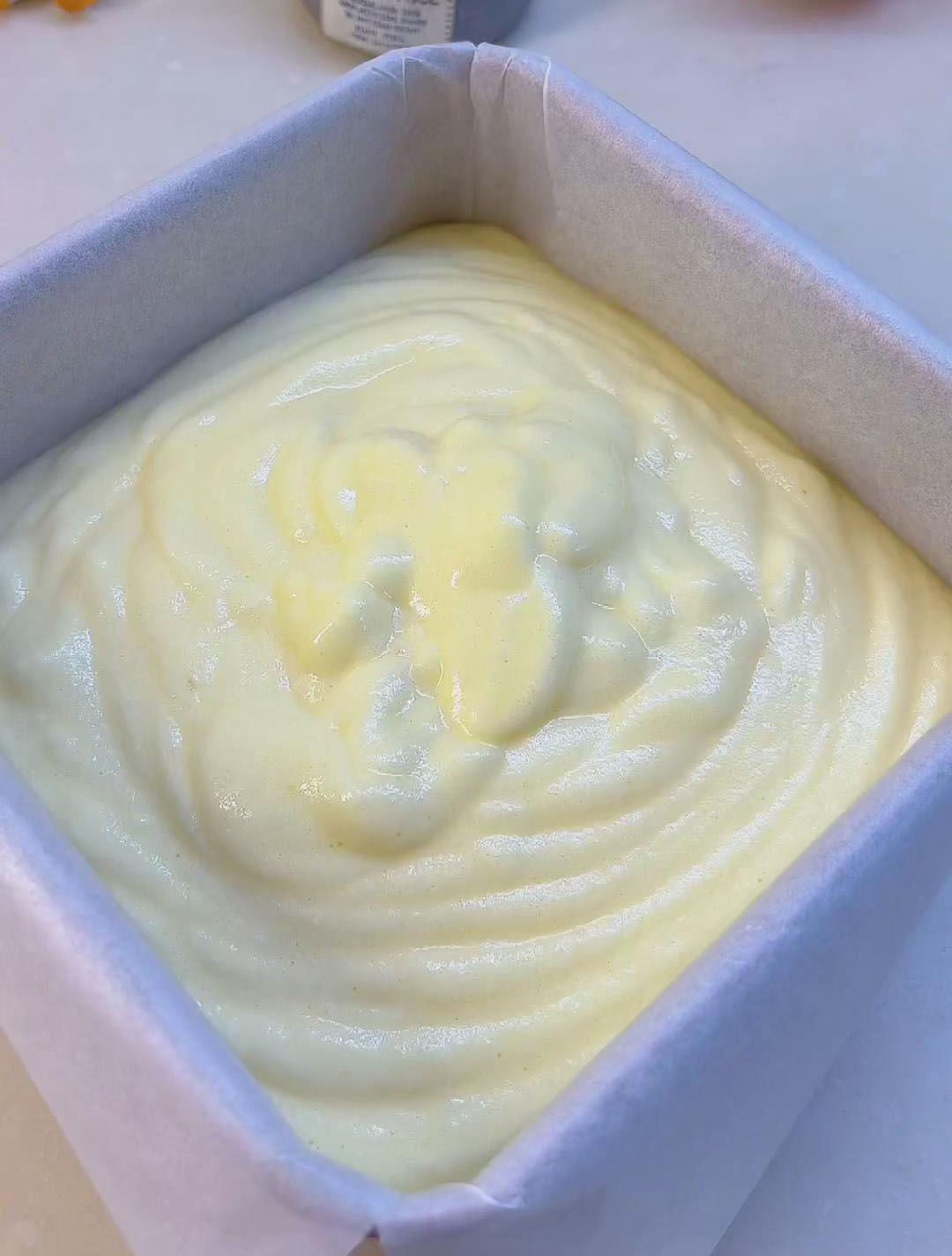 pour the batter into the prepared 6 inch cake pan