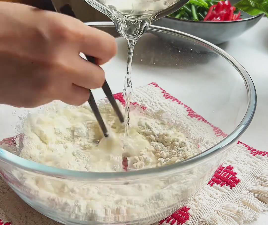 slowly pour in 150g water