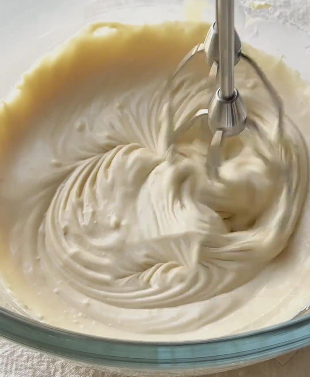 adding heavy cream and coffee liquid