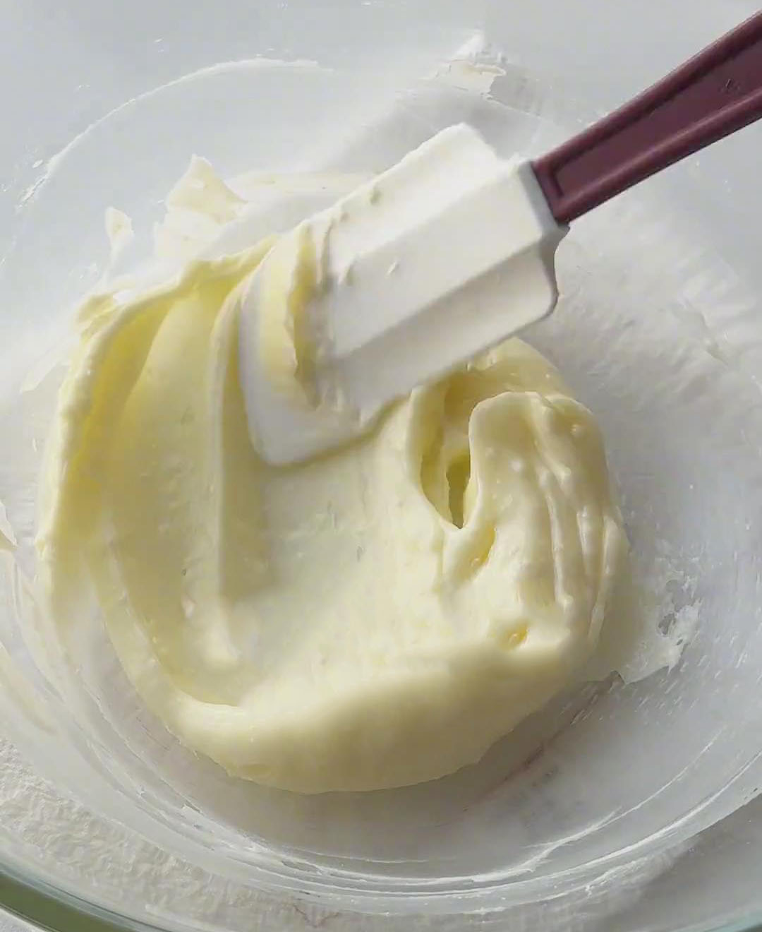 mixing butter and powdered sugar