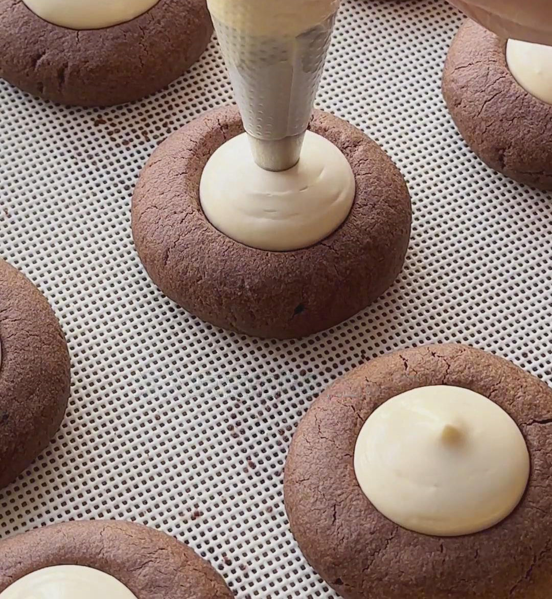 pipe the filling into the center of each cookie